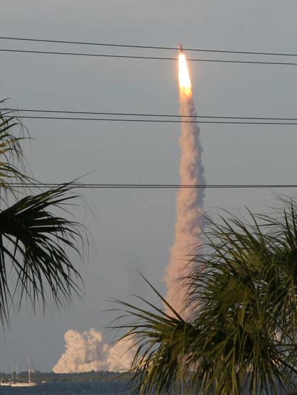 Atlantis blasts into space